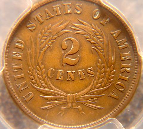 A two-cent piece minted in 1864: the first year to include "In God We Trust" on coinage. Collection of the author.