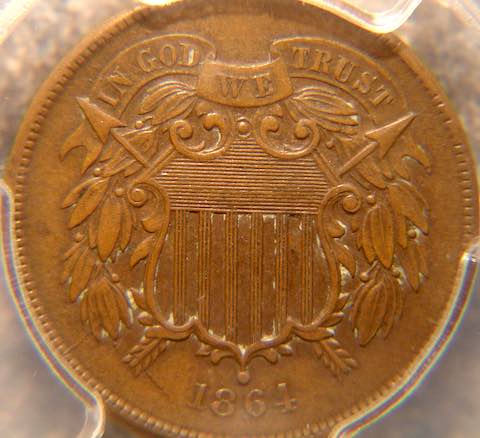 A two-cent piece minted in 1864: the first year to include "In God We Trust" on coinage. Collection of the author.