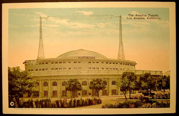 The Angelus Temple in Los Angeles, California. Home of Aimee Semple McPherson and the Church of the Four Square Gospel. Shows her radio broadcasting antennas. Collection of the author.