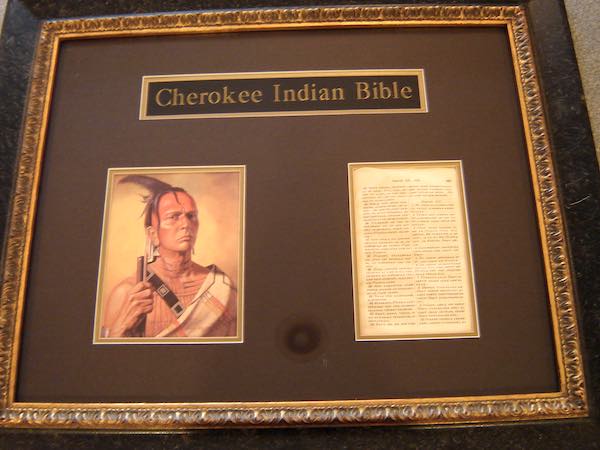 Museum display. Full page from the 1860 Cherokee Bible, published by the American Bible Society. Collection of the author.