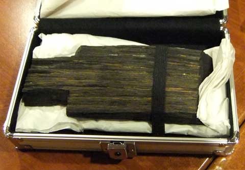 The main piece of wood brought back from the Noah's Ark expedition to Mt. Ararat. The cuts were made for laboratory sample research.