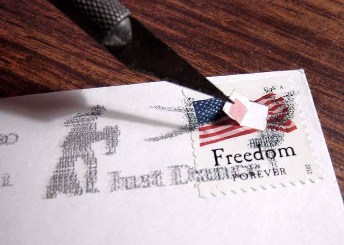 Another method shows how a holographic rendition of the Holy Bible can be hidden under a postage stamp. This tiny piece of photopolymer film contains a laser recording of the entire Bible.